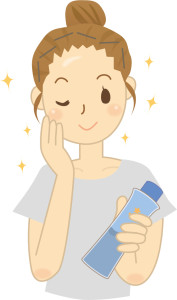 化粧水を付ける女性